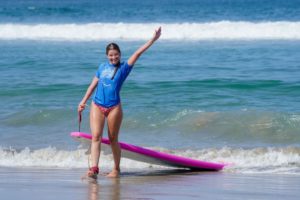 Surf Lessons - Girl On the Beach